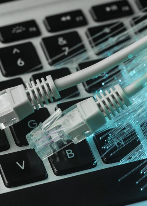 blue-optic-fiber-with-ethernet-cables-laptop blue-optic-fiber-with-ethernet-cables-laptop